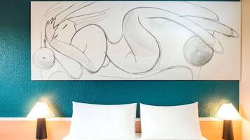 Premium bedding, desk, blackout drapes, soundproofing