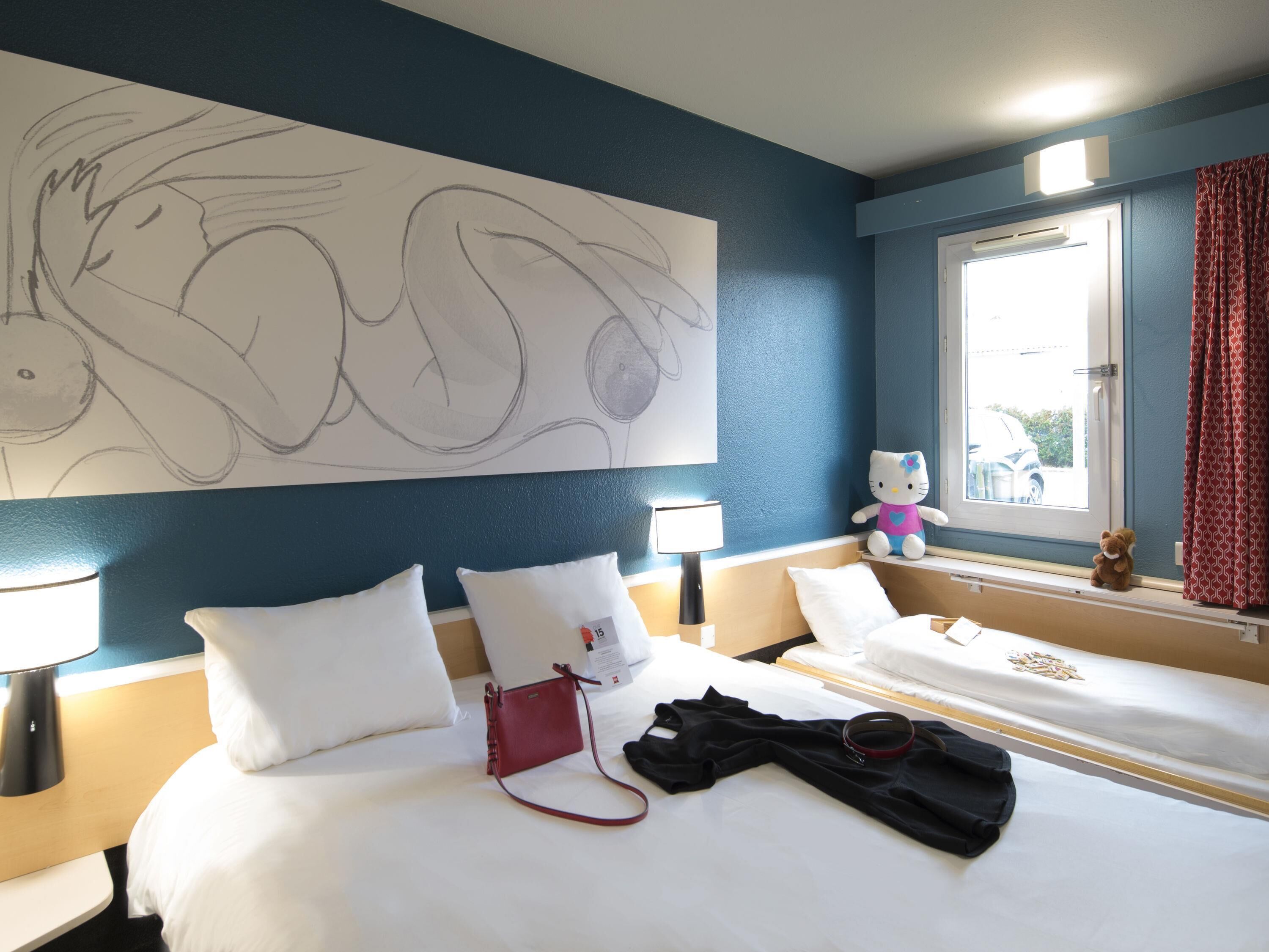 Premium bedding, desk, blackout drapes, soundproofing