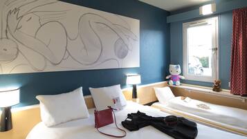 Premium bedding, desk, blackout drapes, soundproofing