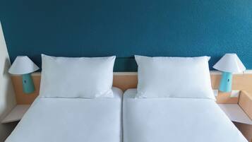 Standaard Twin kamer, 2 eenpersoonsbedden | Luxe beddengoed, een bureau, verduisterende gordijnen