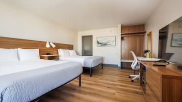 Pillow-top beds, desk, blackout curtains, iron/ironing board