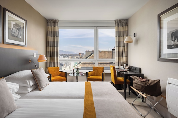 Signature kamer | 1 slaapkamer, een minibar, een kluis op de kamer, een bureau