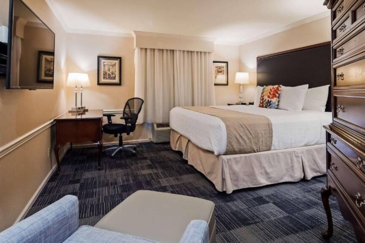 premium bedding, pillow-top beds, desk, laptop workspace