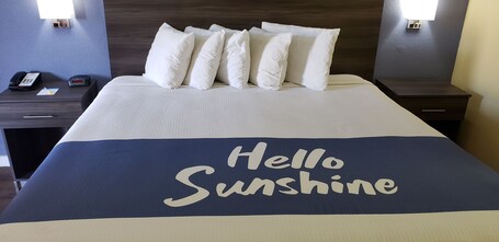 Desk, laptop workspace, blackout drapes, iron/ironing board