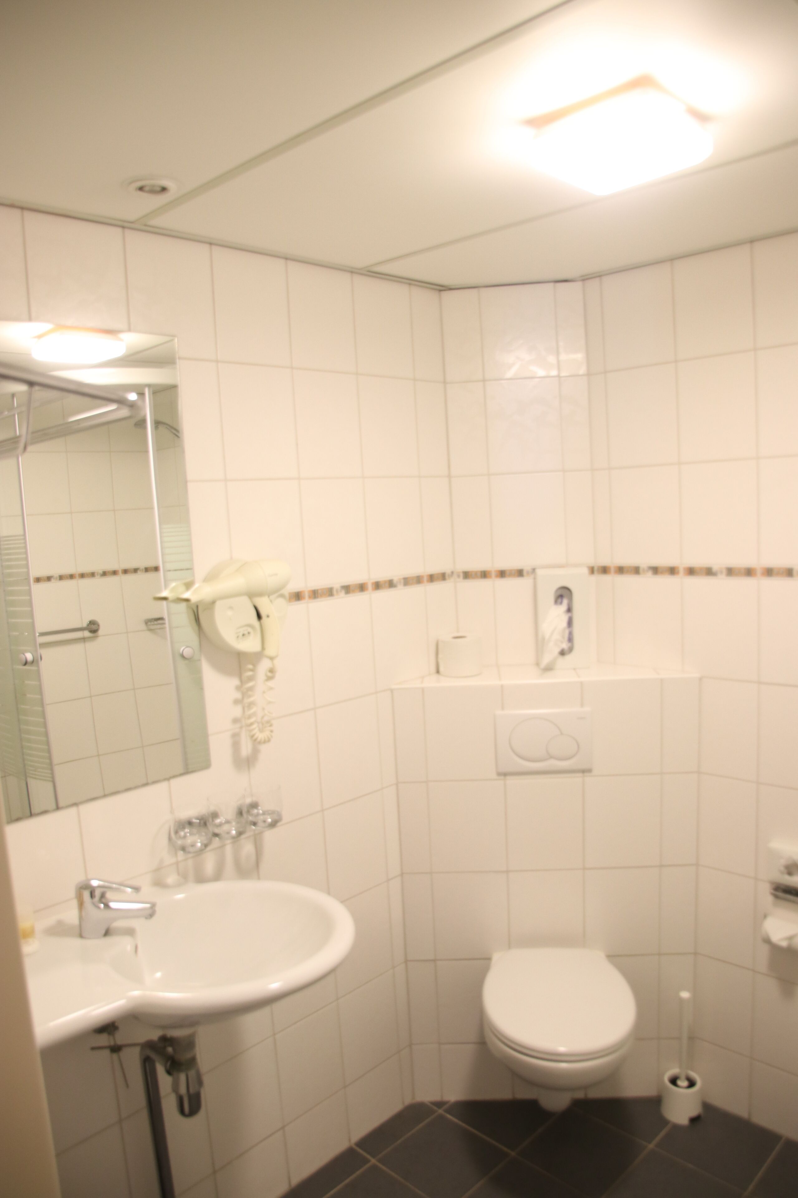 shower, eco-friendly toiletries, hair dryer, towels