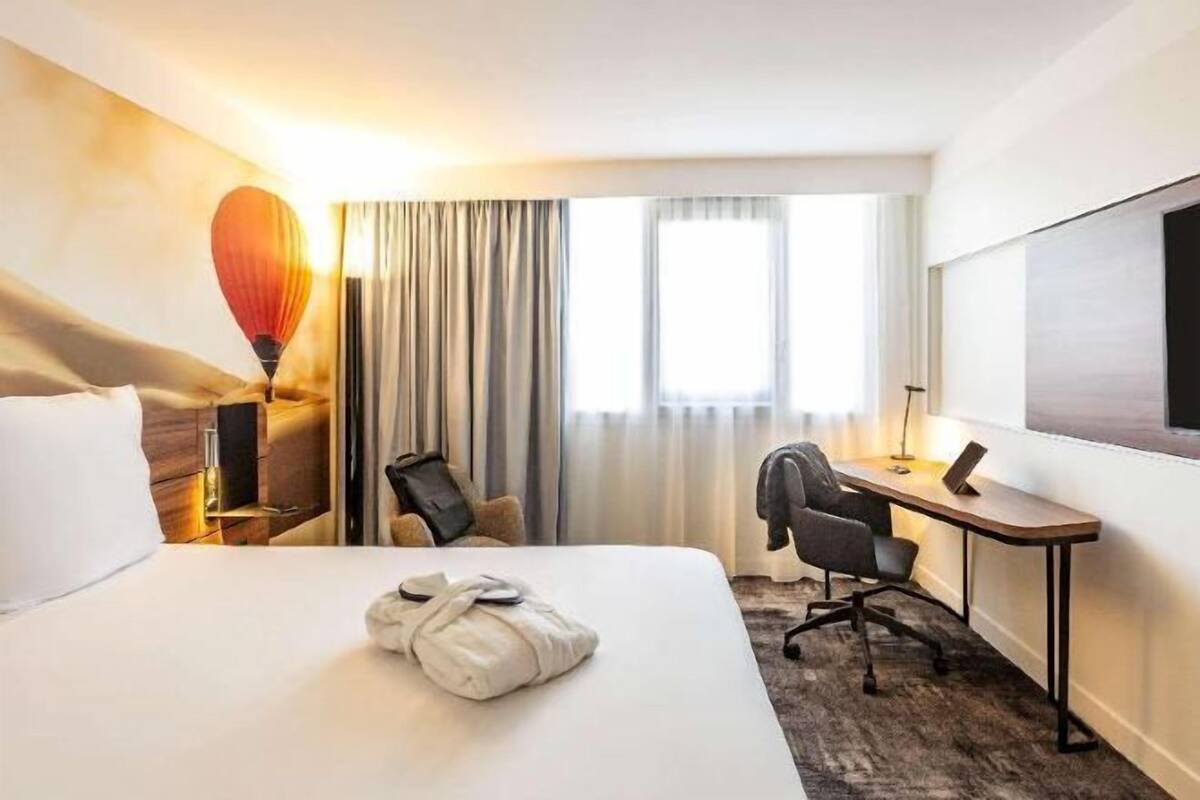 Roba de llit d'alta qualitat i caixa forta a l'habitació
