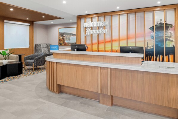 Welcome to Hampton, where guests can check in and enjoy a scenic coastal view.