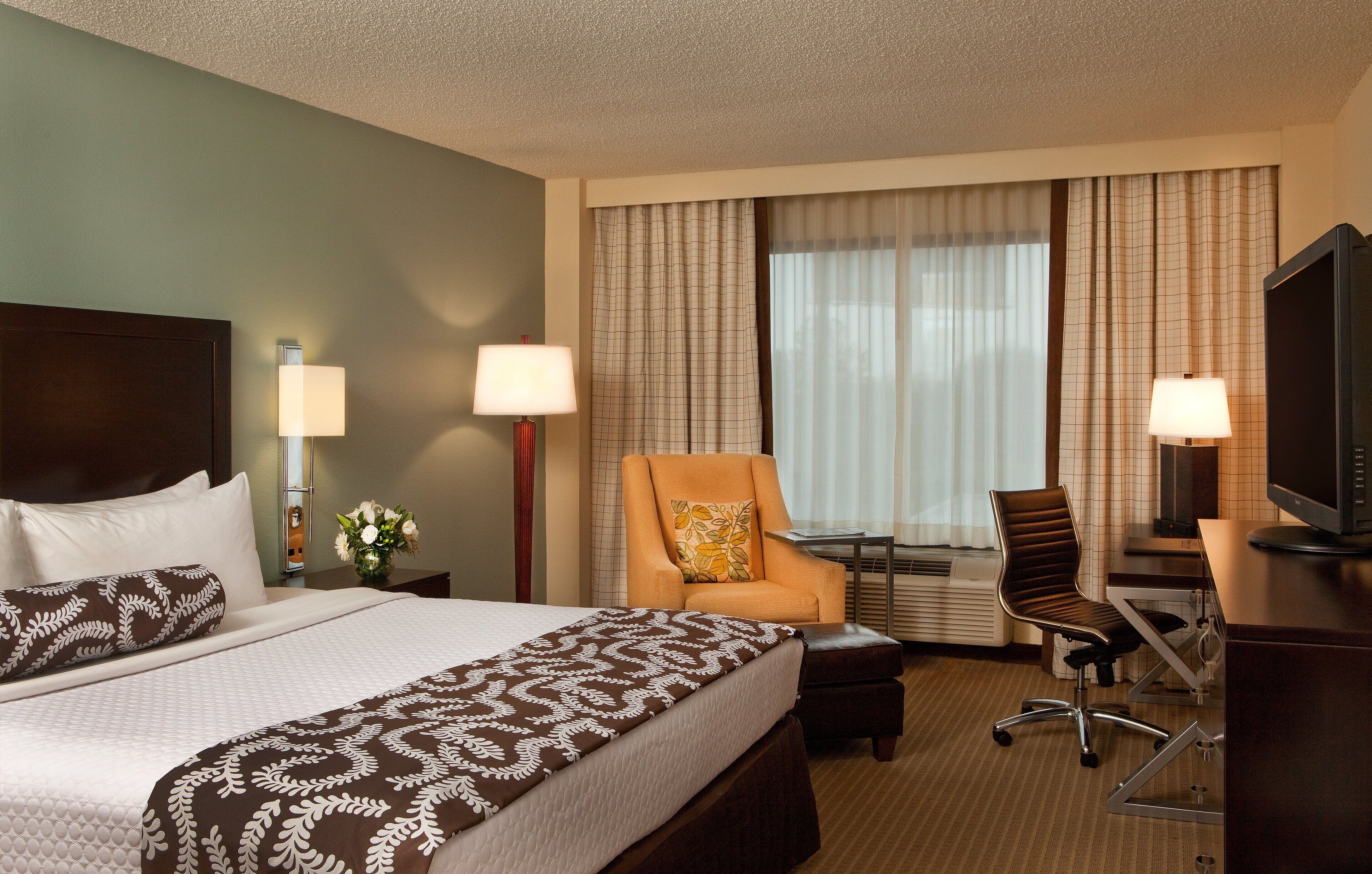 Hypo-allergenic bedding available, in-room safe, desk, laptop workspace