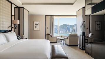 Premium bedding, down comforters, minibar, in-room safe