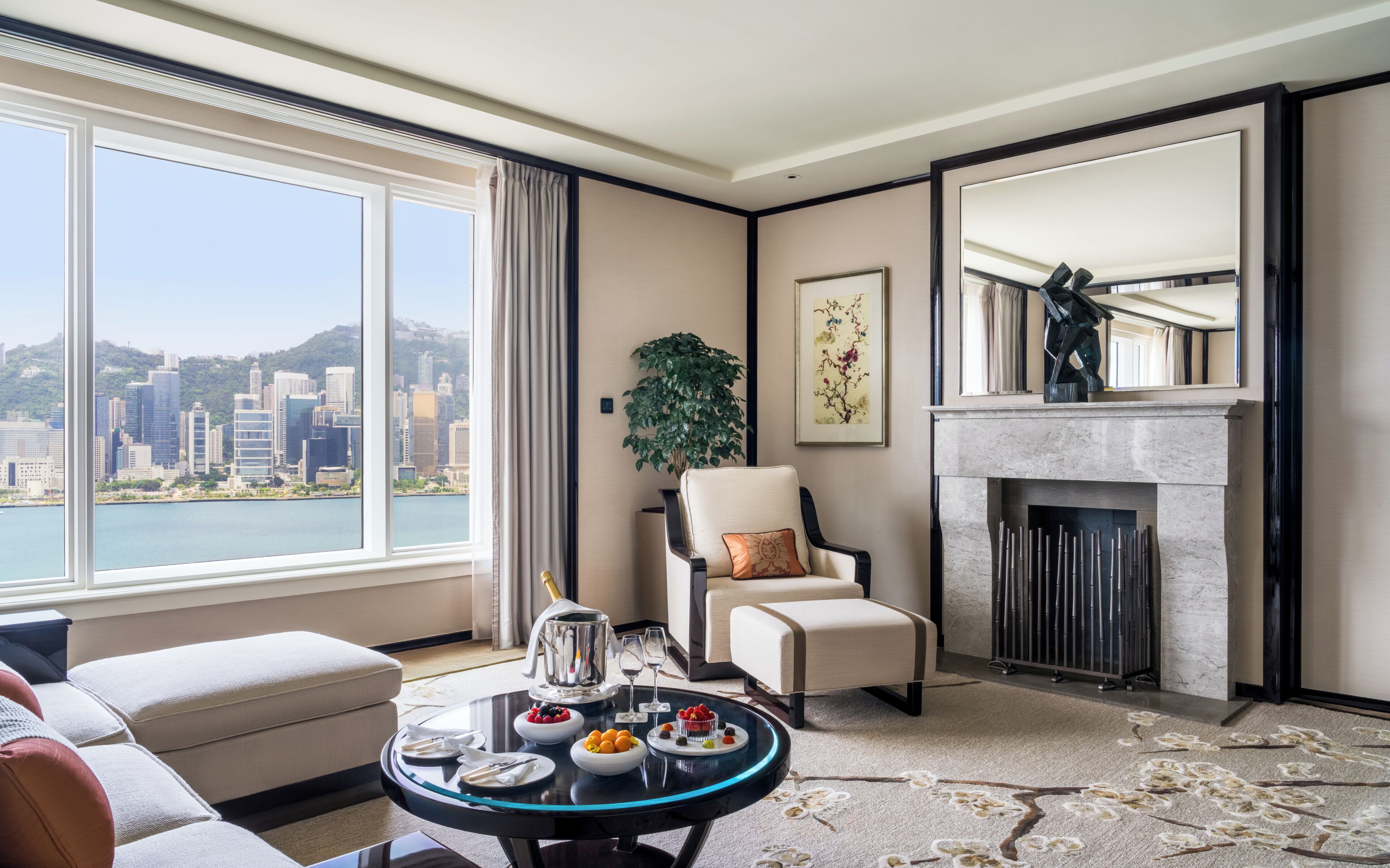 Grand Deluxe Harbour View Suite | Living room | 55-inch LCD TV with satellite channels, TV, DVD player