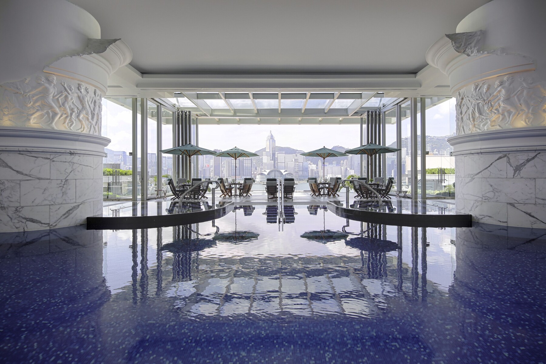 Indoor pool, open 6:00 AM to 9:30 PM, free cabanas, pool umbrellas