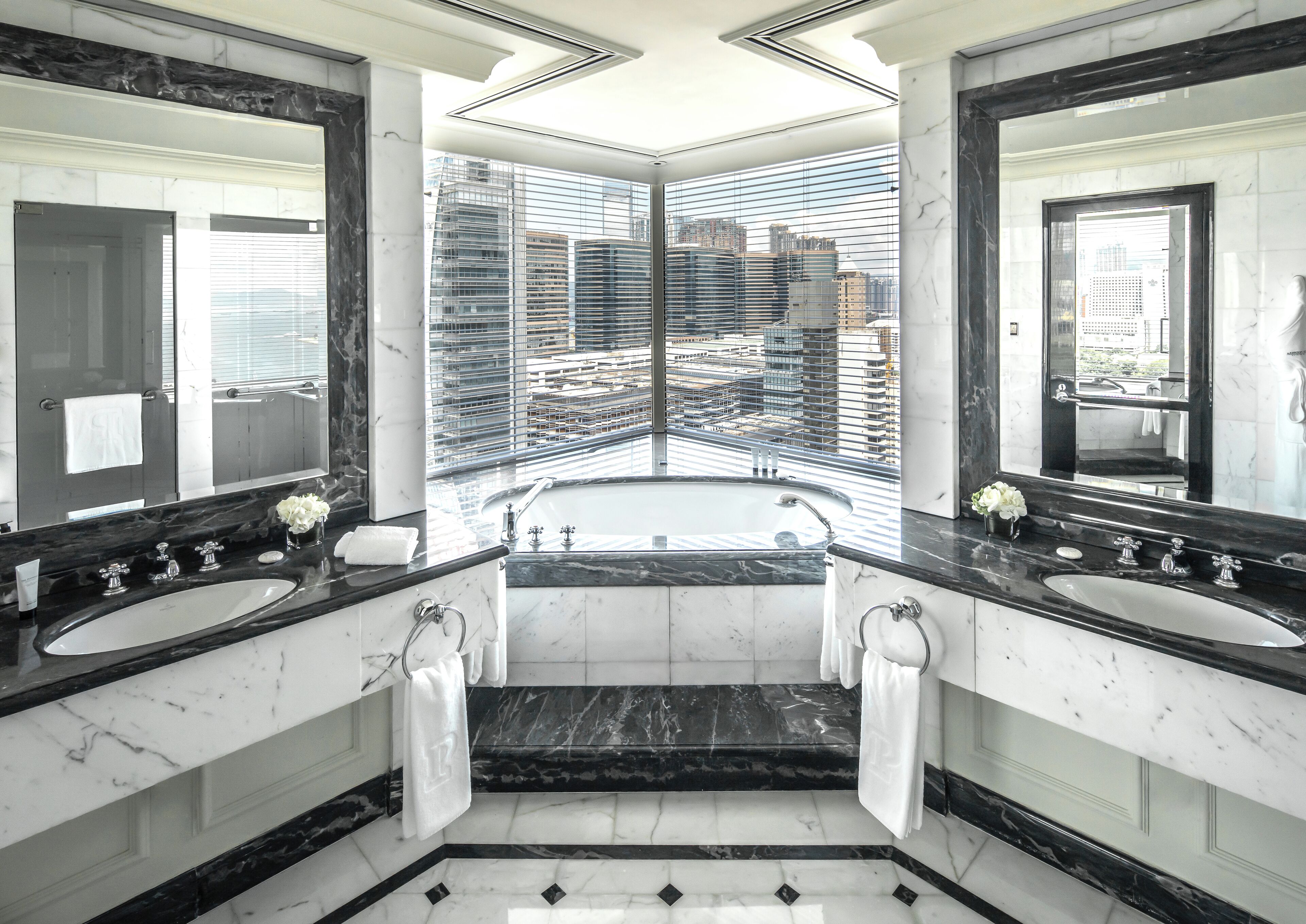 grand deluxe harbour view suite | bathroom | separate bathtub and shower, rainfall showerhead, designer toiletries