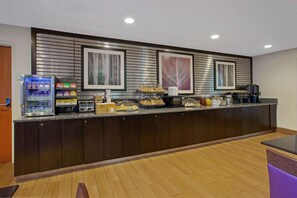Free daily continental breakfast - La Quinta Inn & Suites by Wyndham Detroit Metro Airport (Romulus)