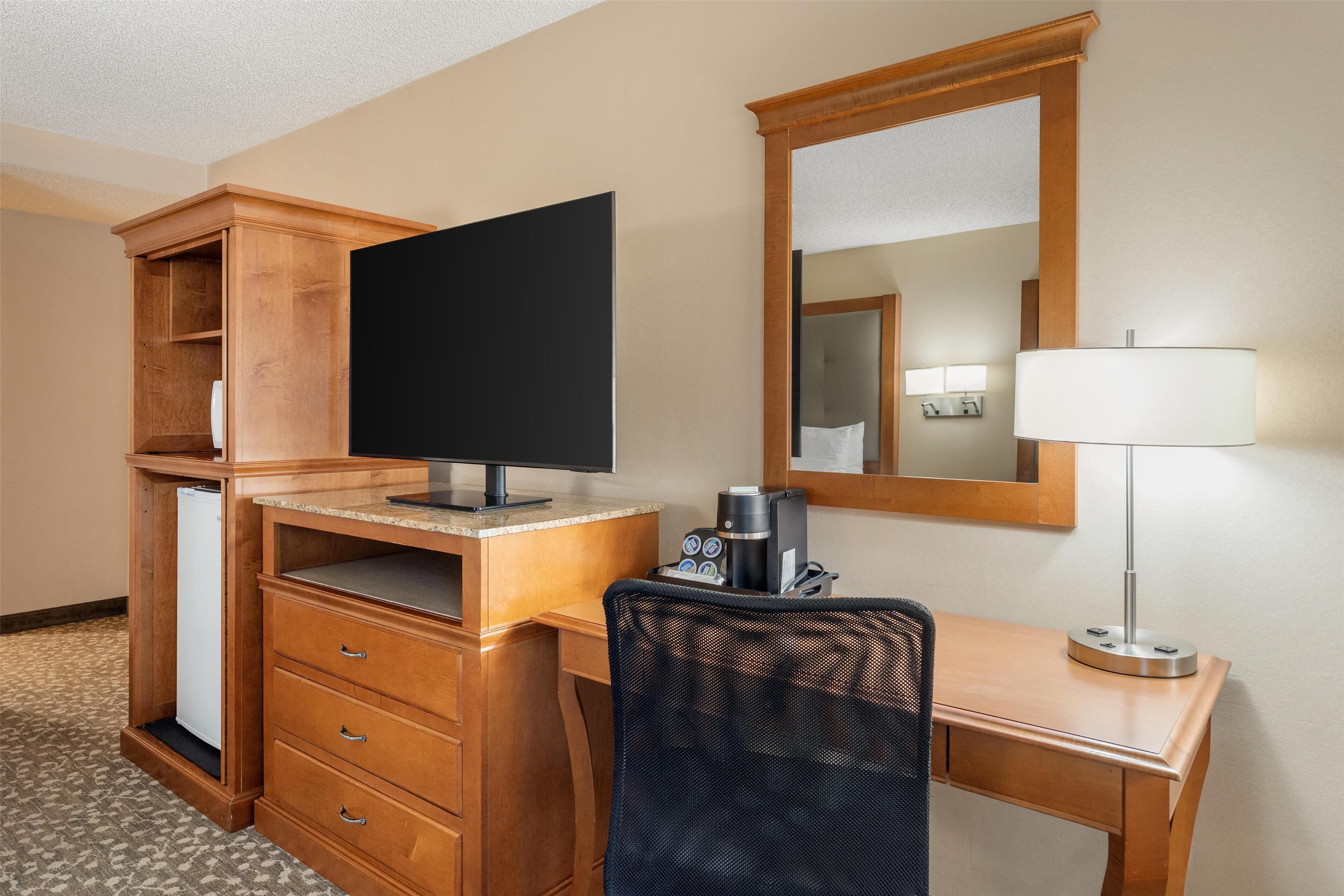 standard room, 2 queen beds, refrigerator & microwave, ground floor | in-room safe, desk, iron/ironing board, free cots/infant beds