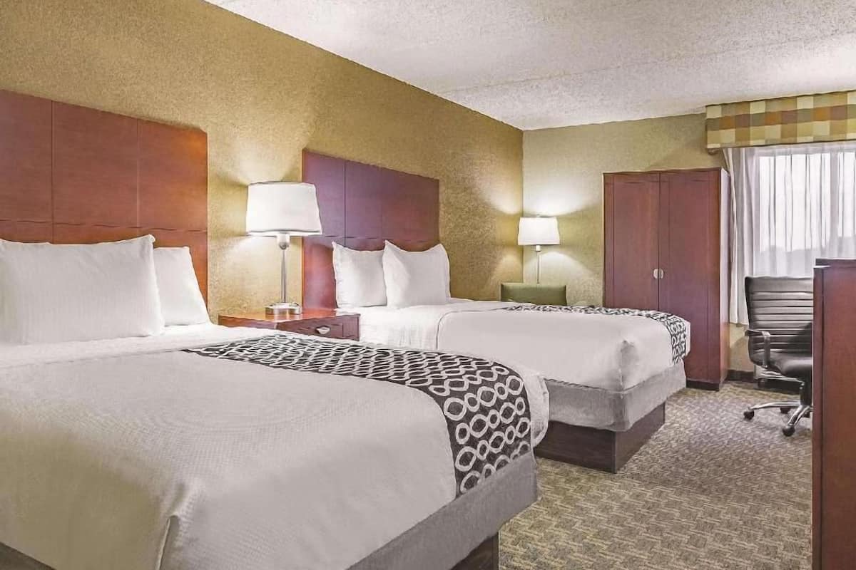 Premium bedding, desk, blackout curtains, iron/ironing board