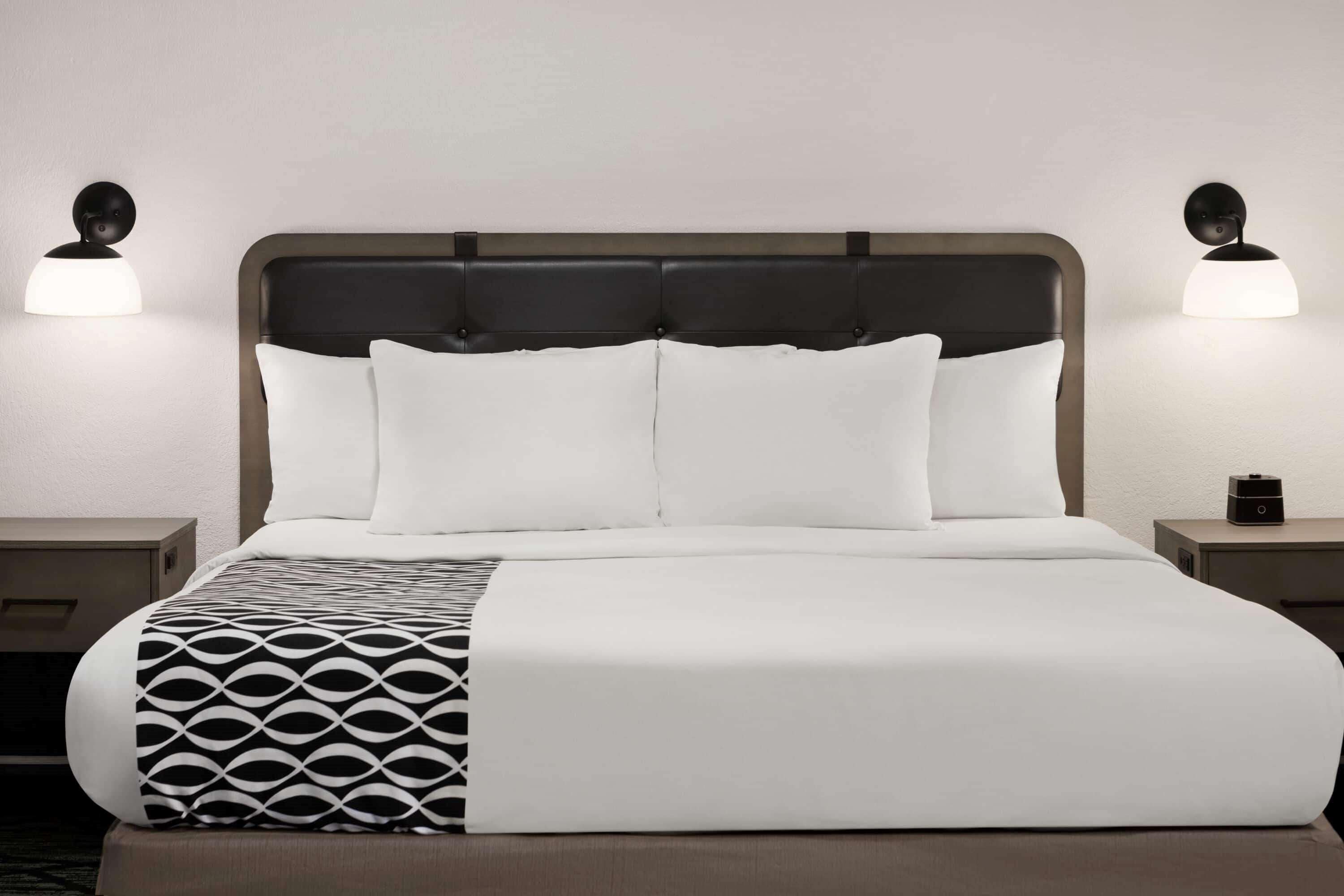 premium bedding, desk, blackout curtains, iron/ironing board