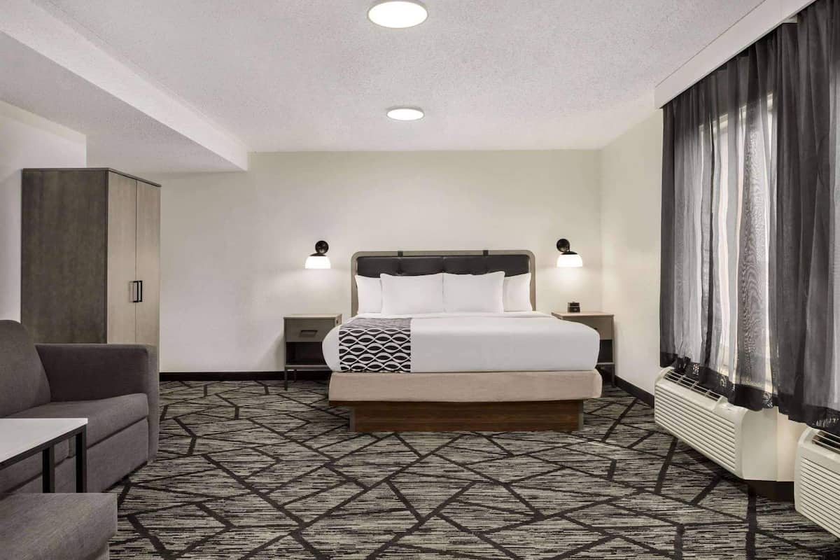 Premium bedding, desk, blackout curtains, iron/ironing board