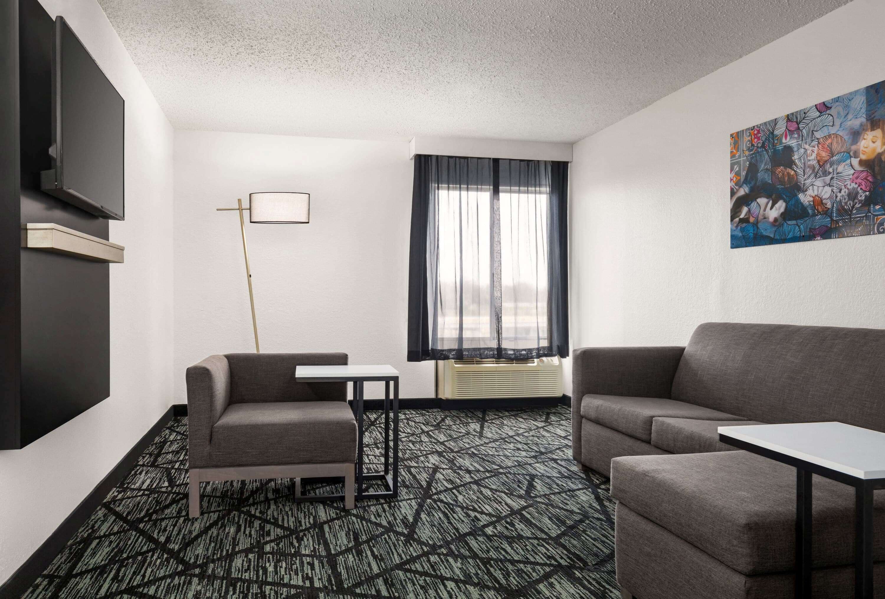 premium bedding, desk, blackout curtains, iron/ironing board