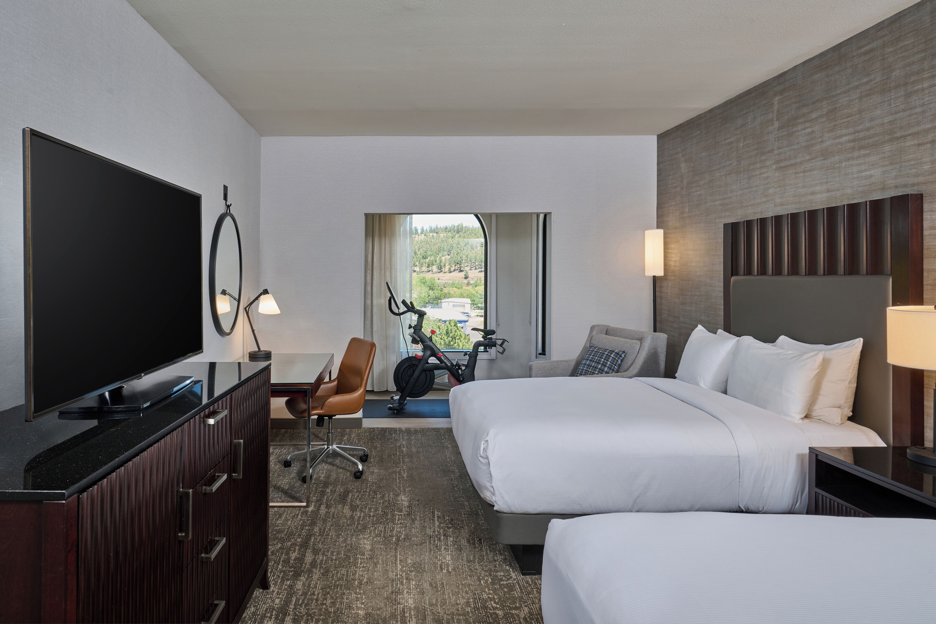 Room, 2 Queen Beds (with Peloton) | In-room safe, desk, blackout drapes, iron/ironing board