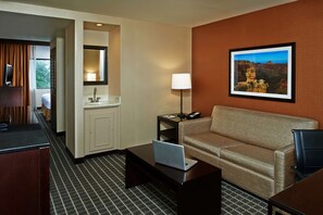 Junior Suite, 1 King Bed | Living area | 37-inch LCD TV with satellite channels, Smart TV, MP3 dock