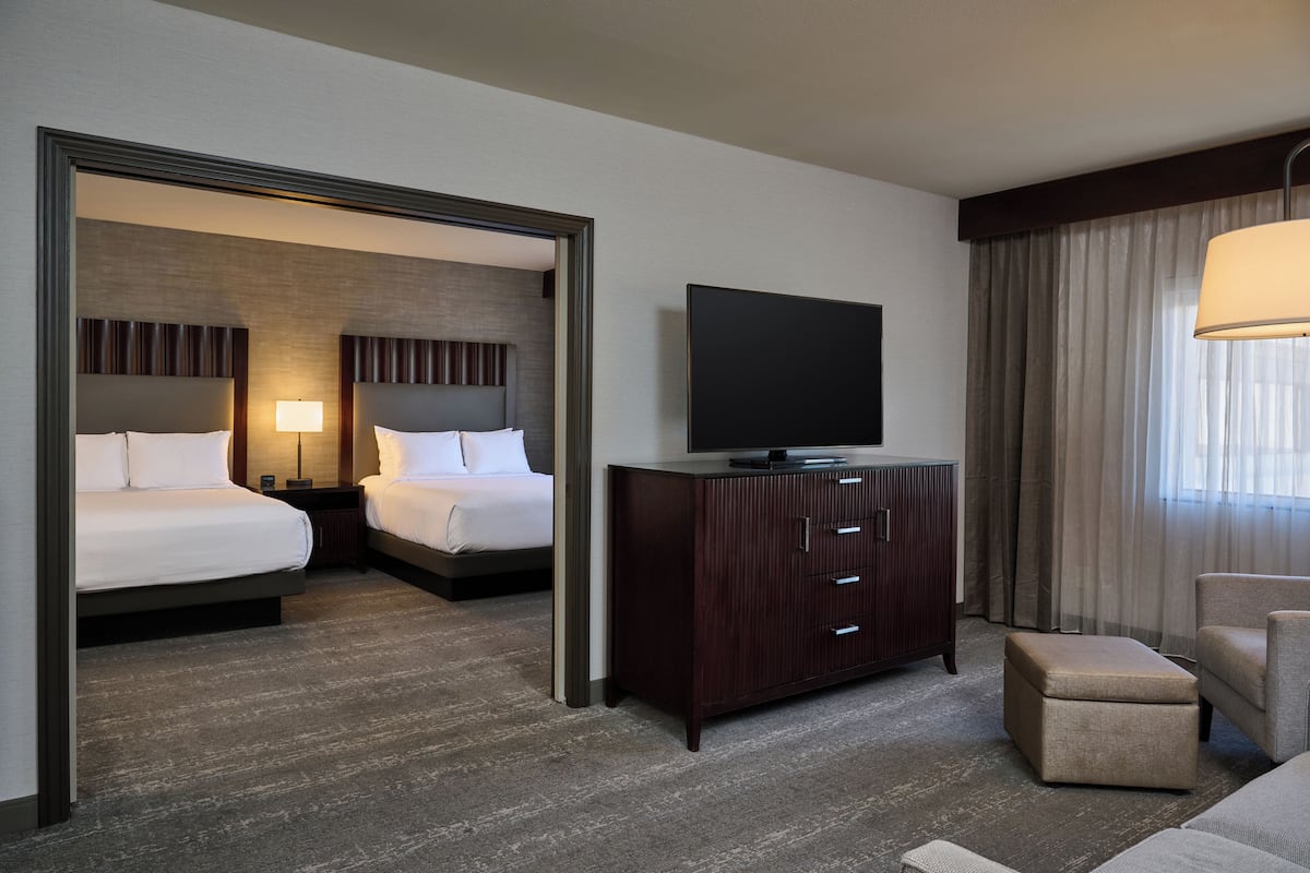 Suite, 2 Queen Beds | In-room safe, desk, blackout drapes, iron/ironing board