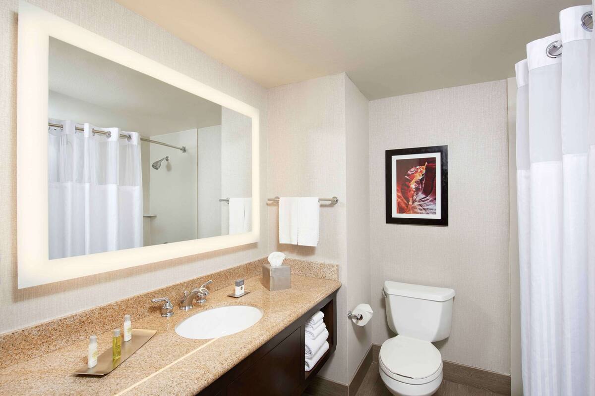 room, 2 queen beds | bathroom | free toiletries, hair dryer, towels, soap