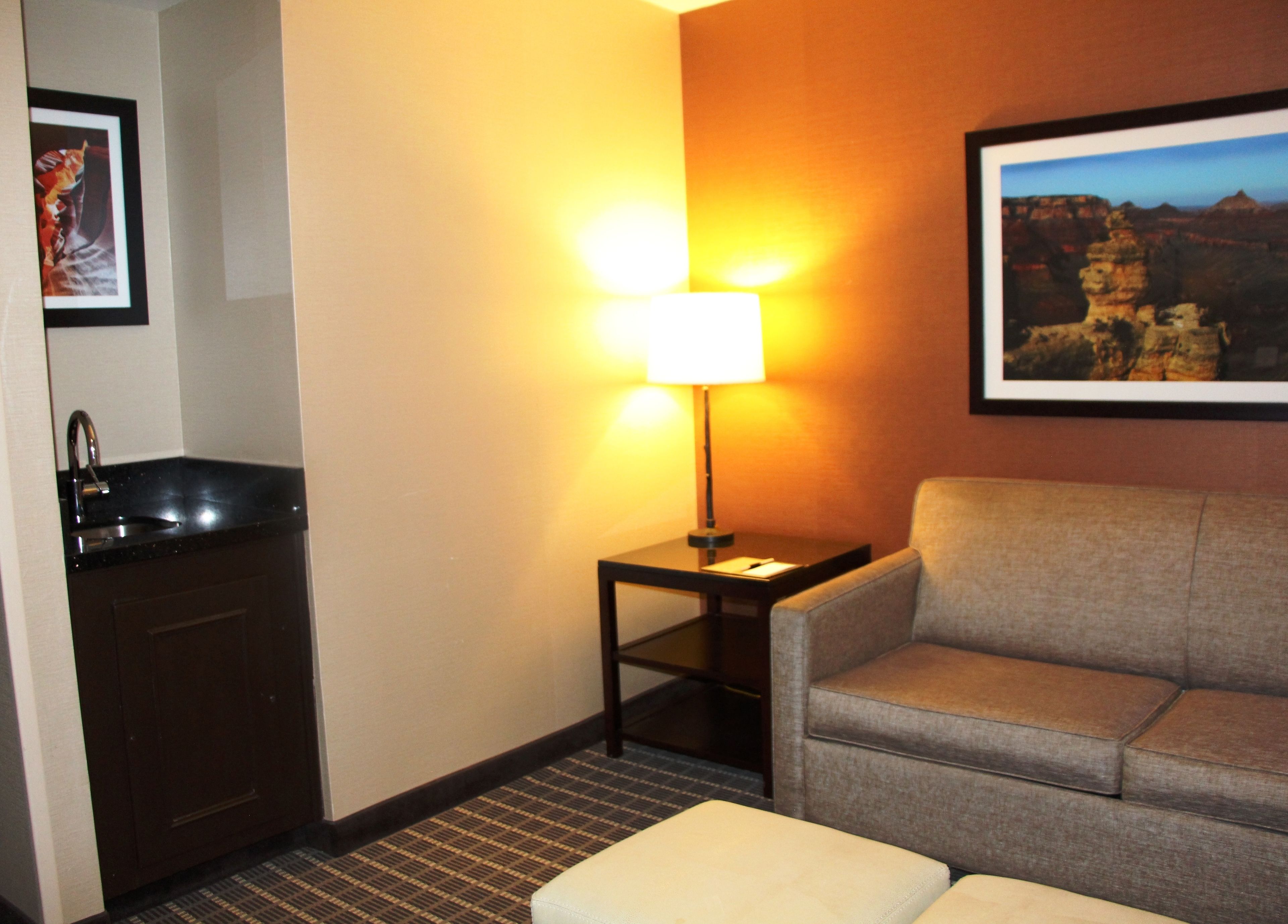 junior suite, 1 king bed | living area | 37-inch lcd tv with satellite channels, smart tv, mp3 dock