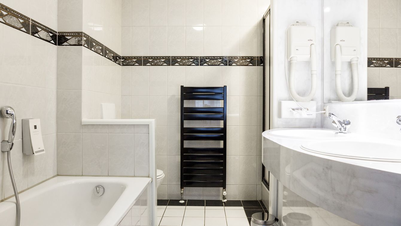 eco-friendly toiletries, hair dryer, towels