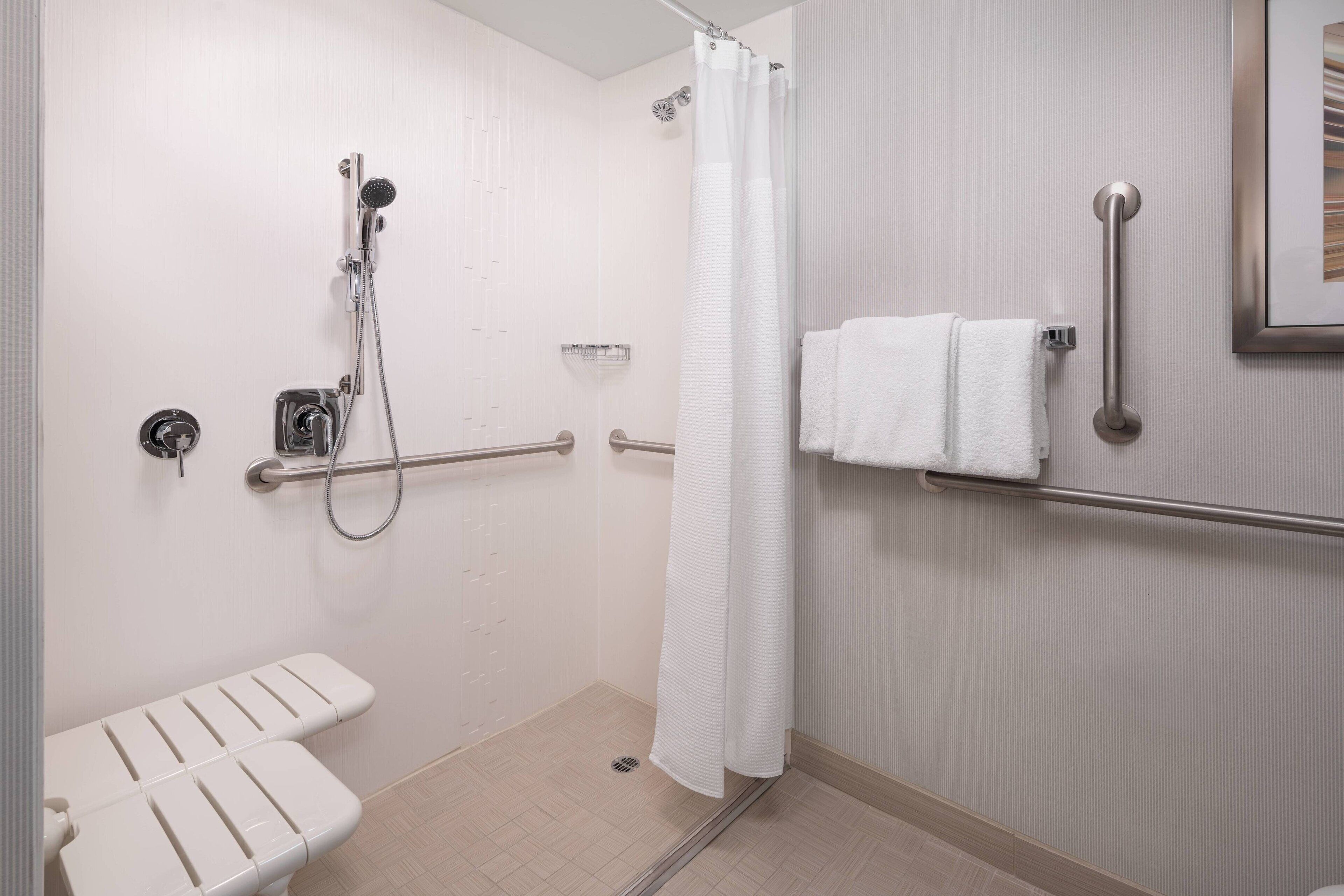 combined shower/bathtub, free toiletries, hair dryer, towels