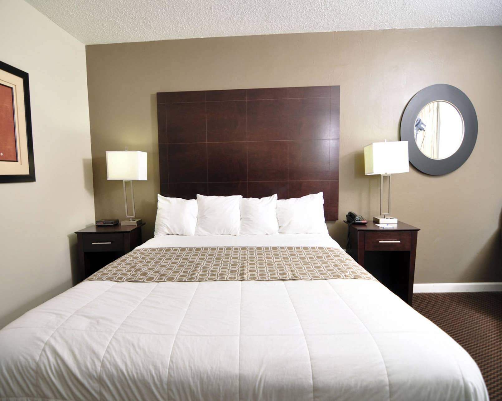 Premium bedding, desk, blackout drapes, soundproofing