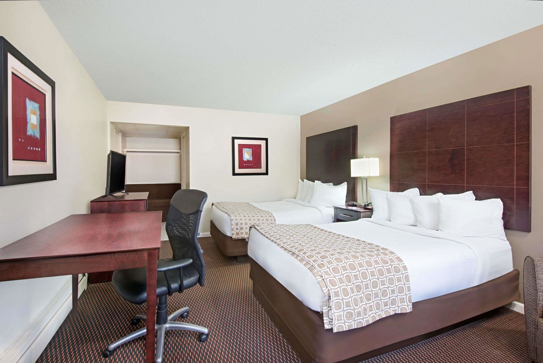 Premium bedding, desk, blackout drapes, soundproofing