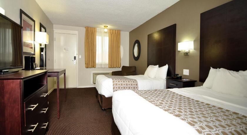 Premium bedding, desk, blackout drapes, soundproofing