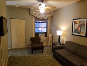 Suite, 1 King Bed | Living area | Flat-screen TV