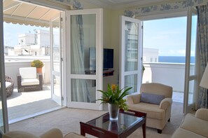 Suite, 2 Bedrooms, Ocean View | Living room | 46-inch LCD TV with cable channels