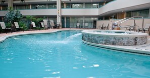 Relax by the pool with lounge chairs and tables, or unwind in the adjacent hot tub.