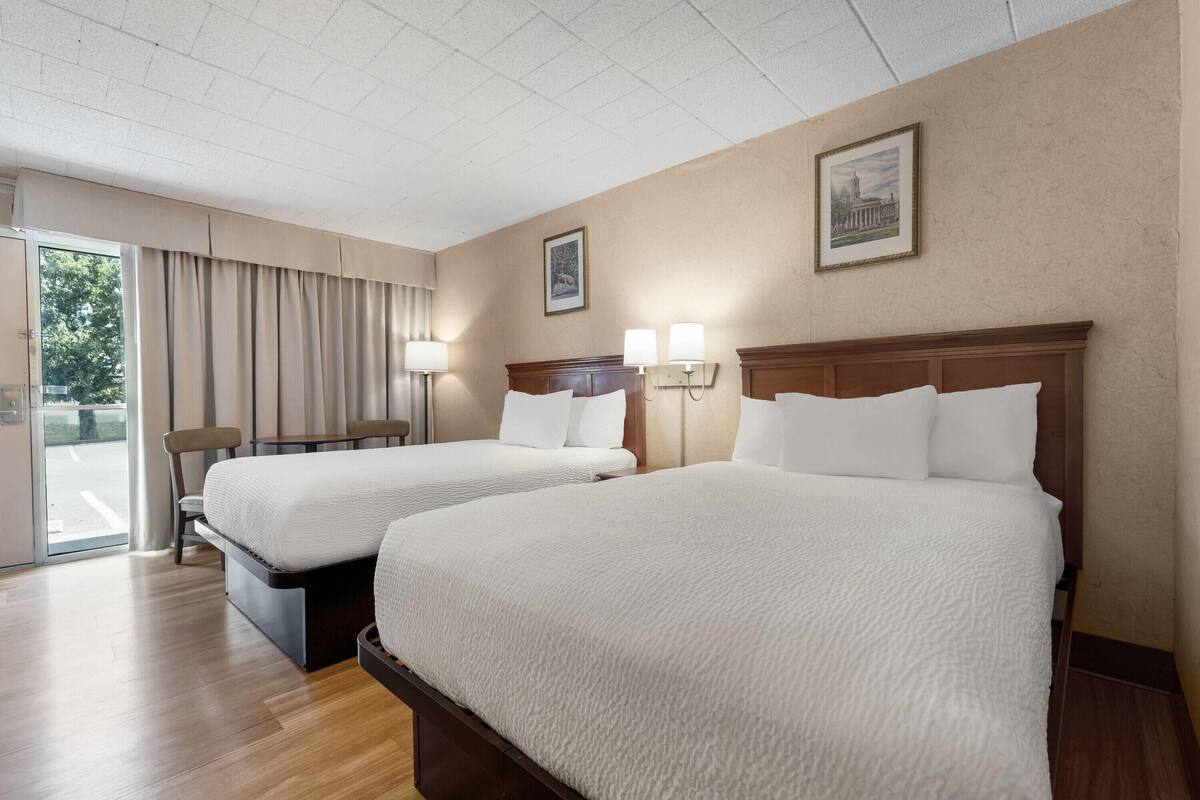 Room, 2 Double Beds, Non Smoking (Exterior Entrance) | Laptop workspace, iron/ironing board, cribs (free), WiFi (free)