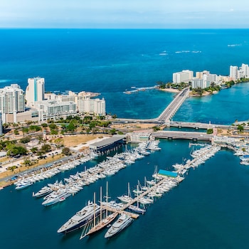 Stunning marina views of the city skyline, with easy access to the city via a nearby bridge. at The Condado Plaza Hotel