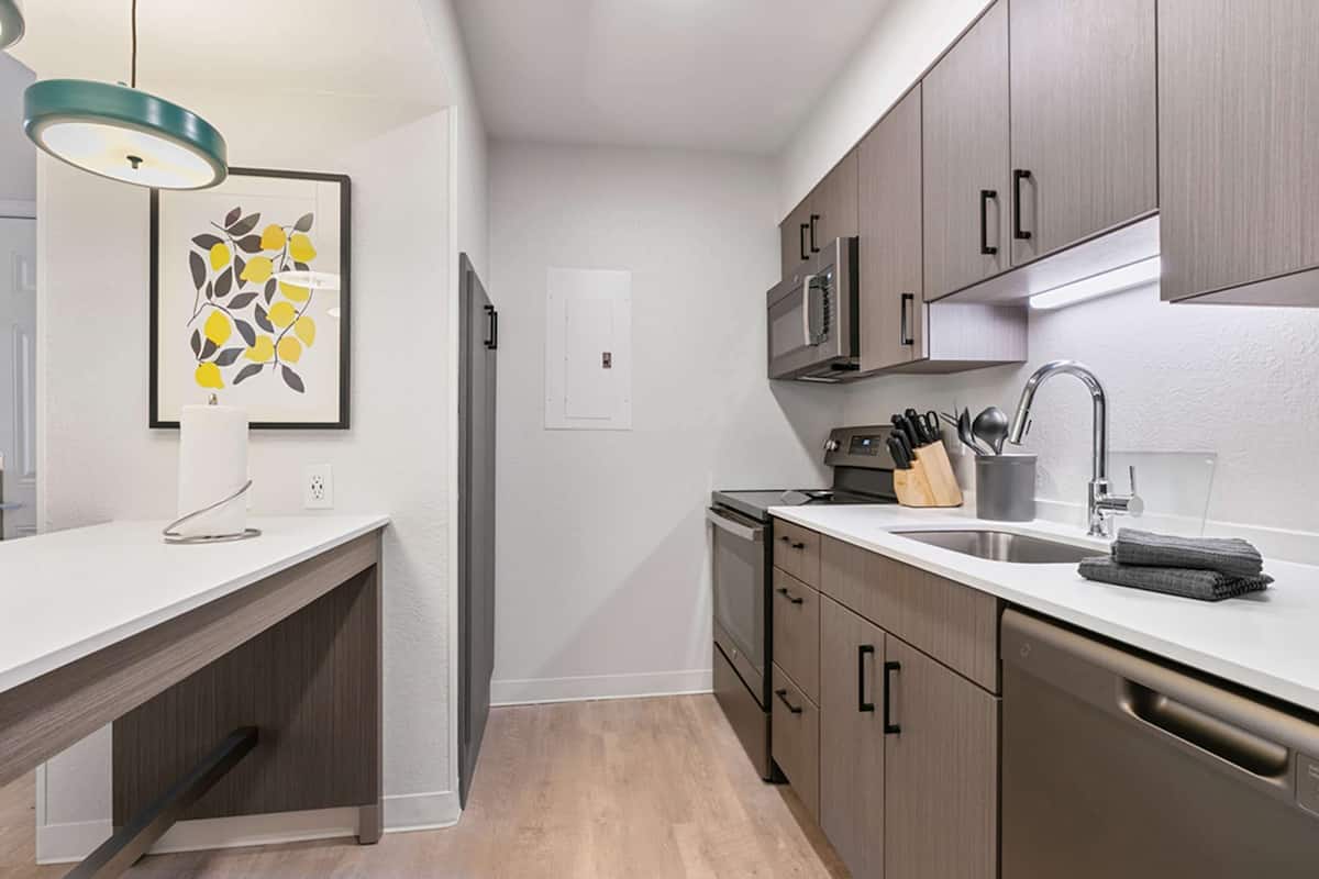 Suite, 1 Bedroom | Down comforters, desk, iron/ironing board, free WiFi