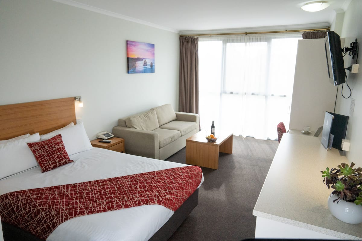 Superior Queen Room | Living area | LCD TV