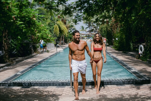 2 outdoor pools, a heated pool, cabanas (surcharge), pool umbrellas
