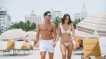 On the beach, beach cabanas, sun loungers, beach umbrellas