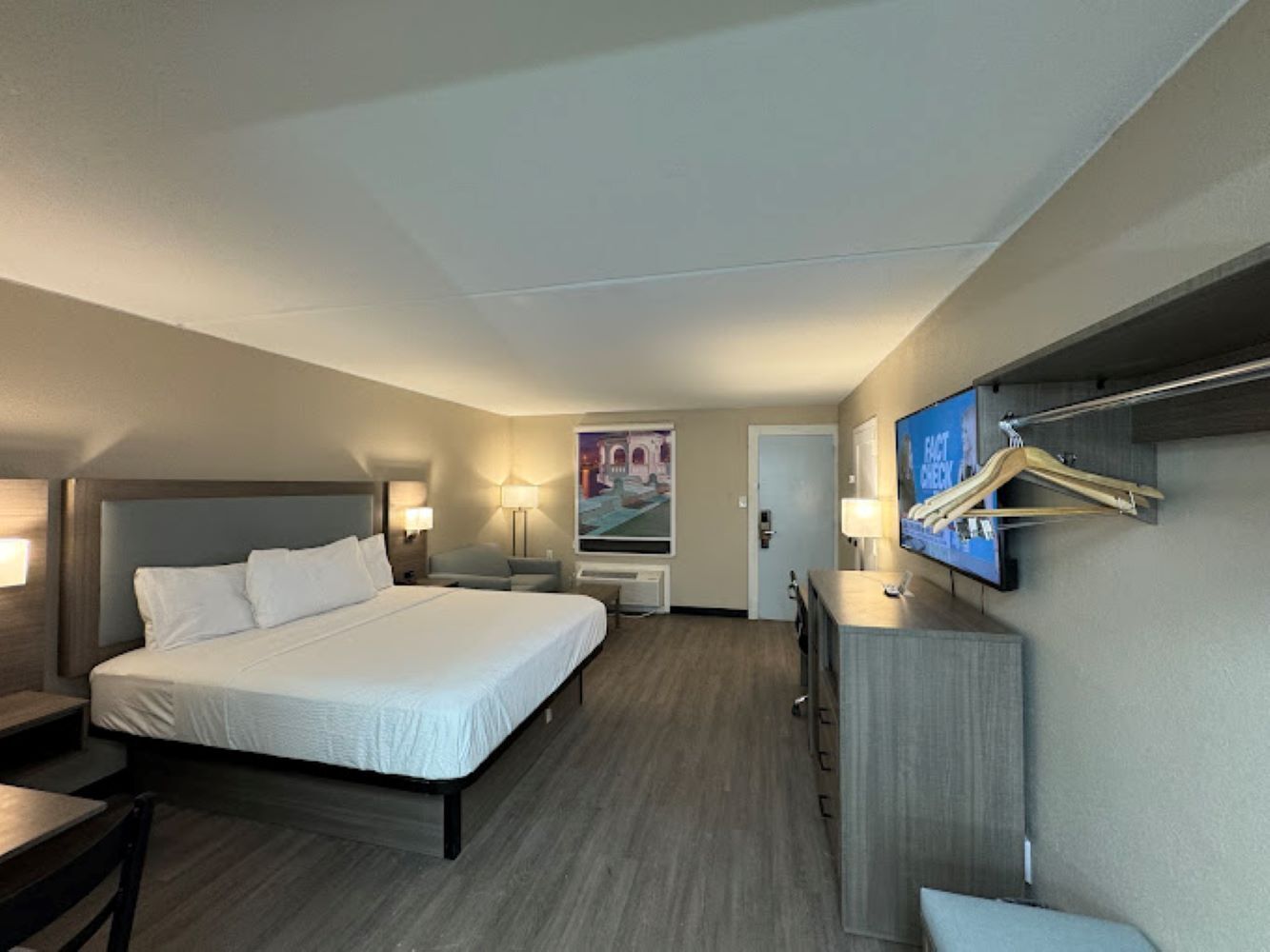 Premium bedding, desk, laptop workspace, soundproofing