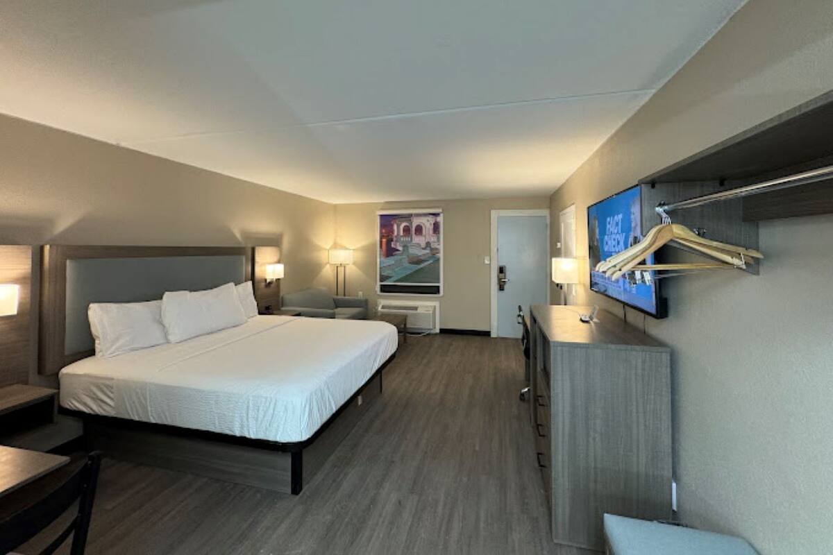 Premium bedding, desk, laptop workspace, soundproofing