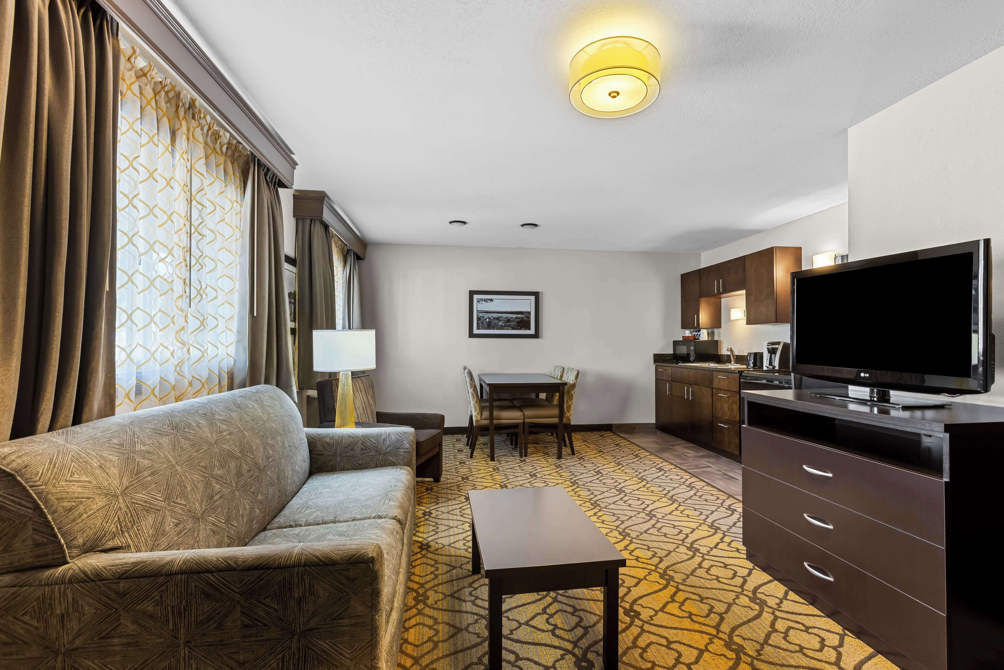 Desk, blackout drapes, iron/ironing board, cribs/infant beds