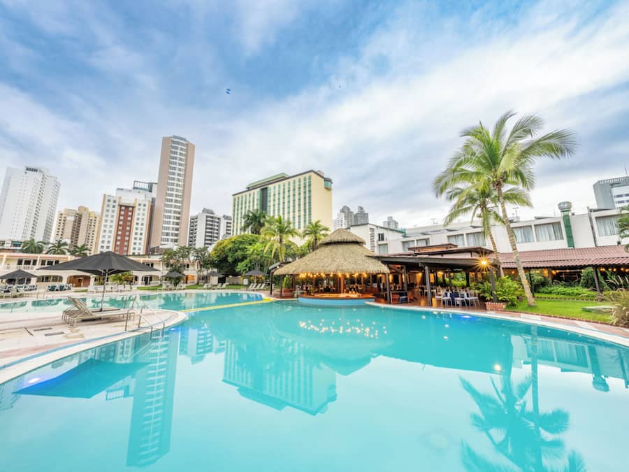 Outdoor pool, open 8:00 AM to 8:00 PM, free cabanas, pool umbrellas