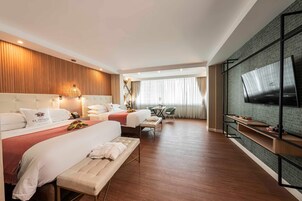 Premium bedding, down duvets, in-room safe, desk