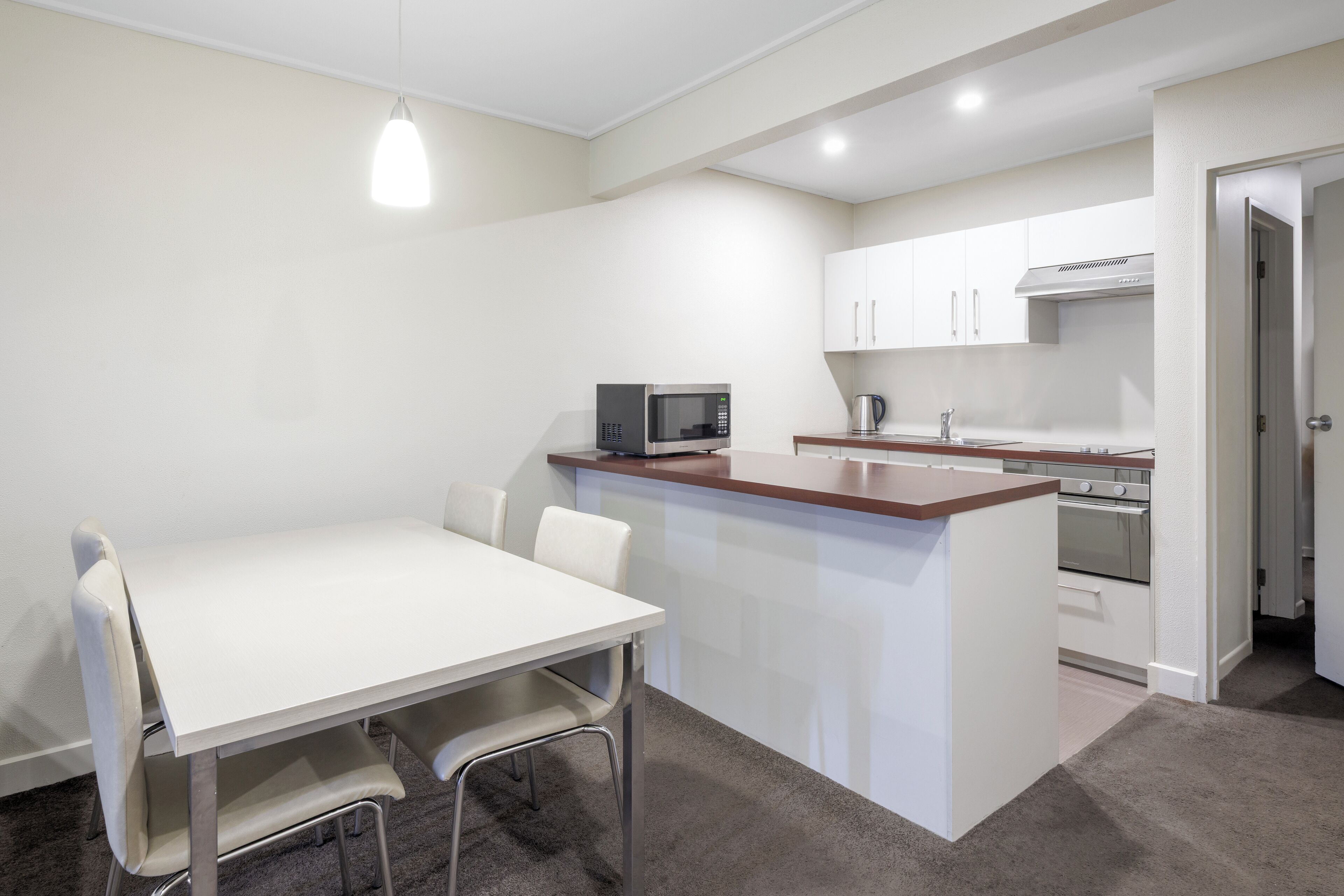Apartamento, 2 quartos | Cozinha americana privada | Frigobar, chaleira elétrica