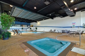 Indoor pool, open 6:00 AM to 10:00 PM, pool loungers