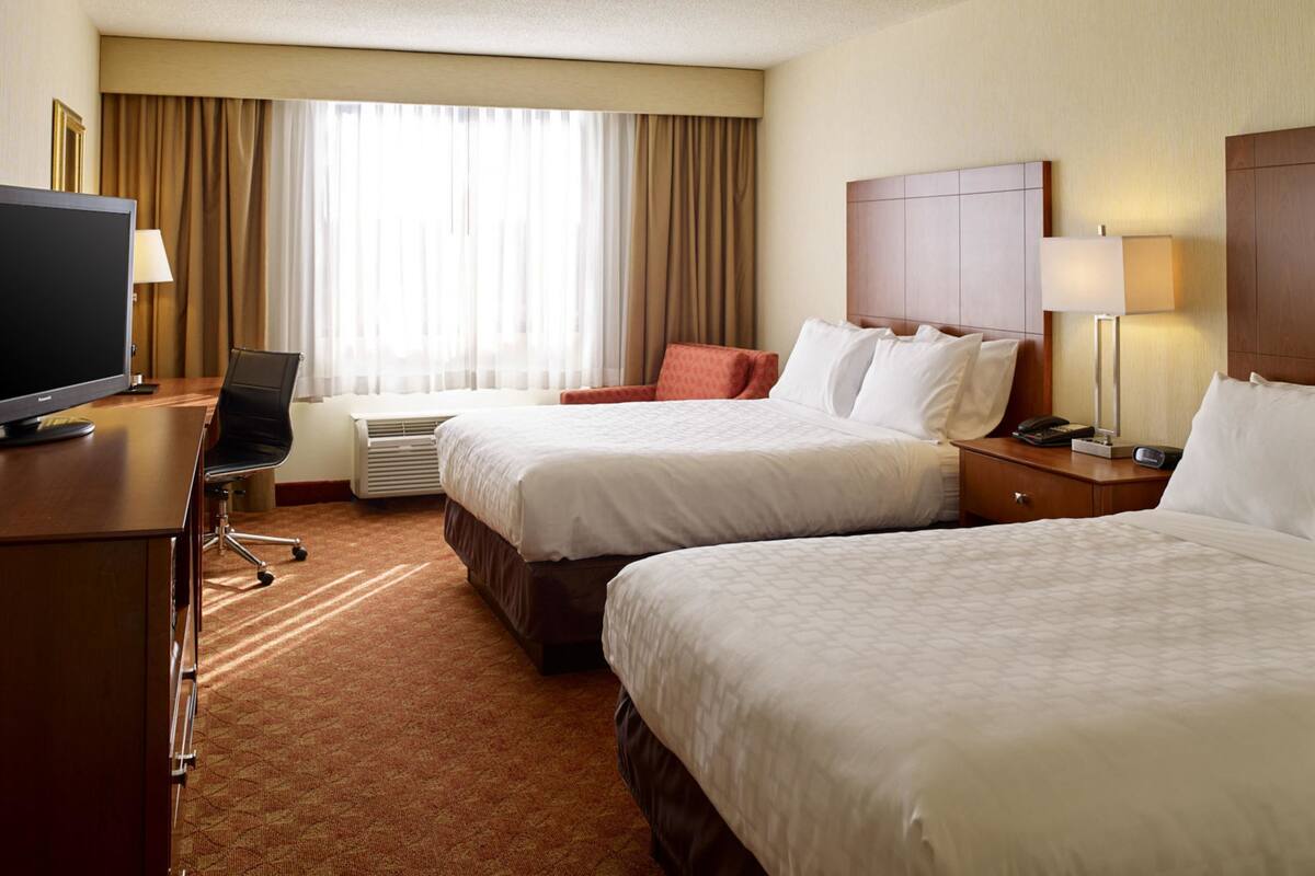 Pillowtop beds, desk, laptop workspace, blackout drapes