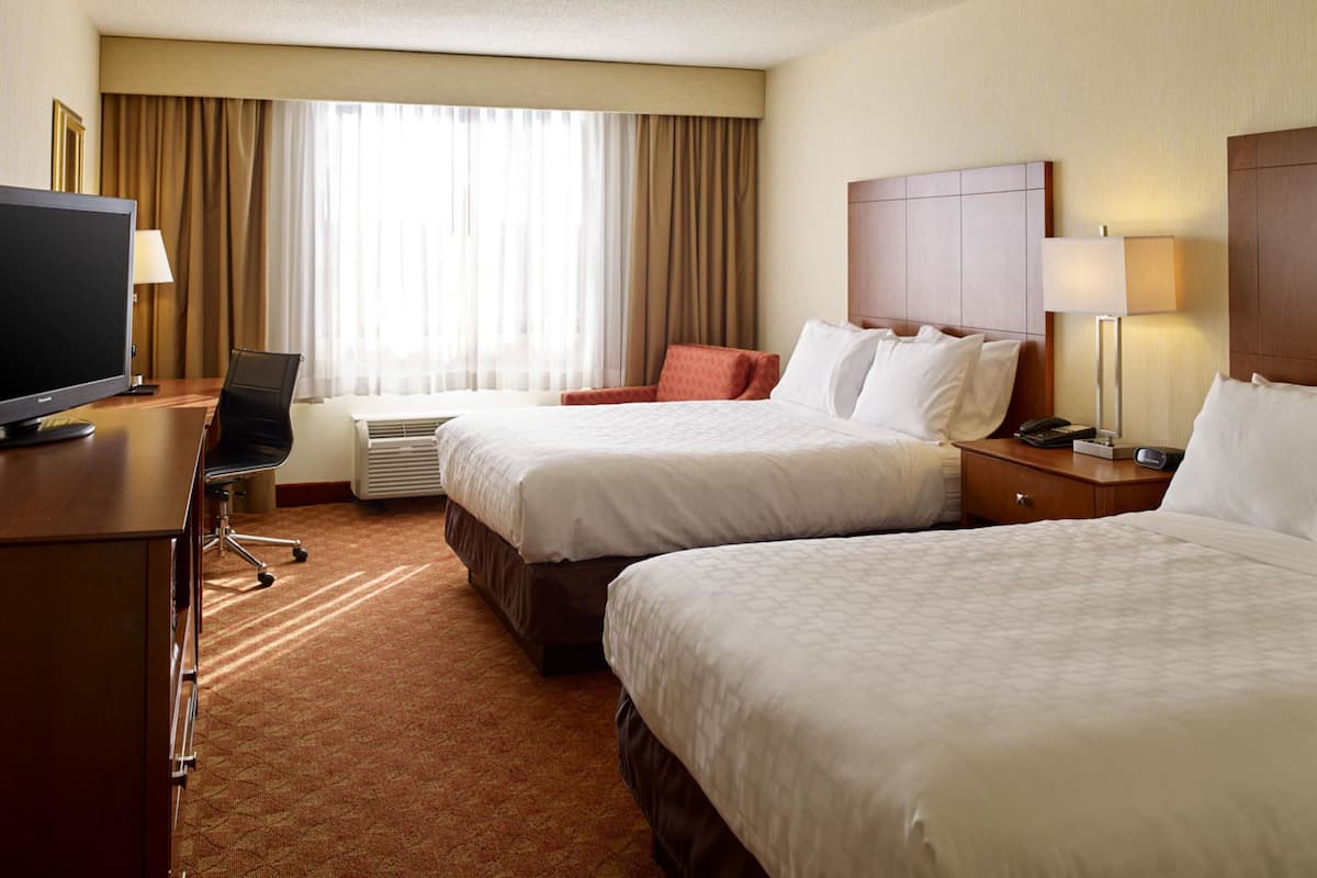 Pillow-top beds, desk, laptop workspace, blackout curtains